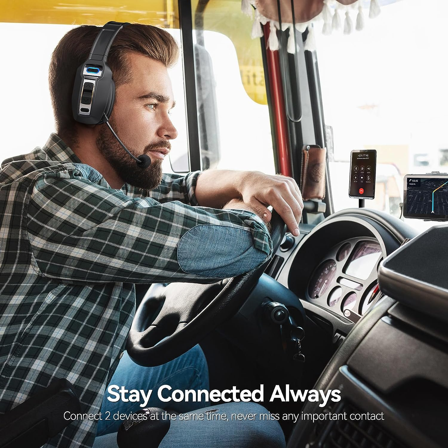 A man wearing a Puce Gaia Trucker Bluetooth 5.2 Wireless Headset with Noise Cancelling Mic drives a truck, checking his dashboard-mounted smartphone. Text reads: Stay Connected Always—manage calls and schedules easily with Puce Gaia.